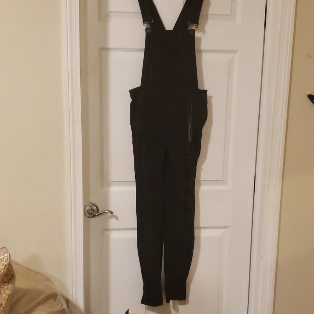 Black distressed jean overalls